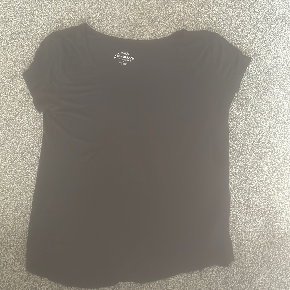This is a plain black shirt with a pocket from rue21 in a size small
